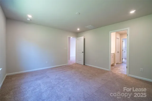 an empty room with an entryway