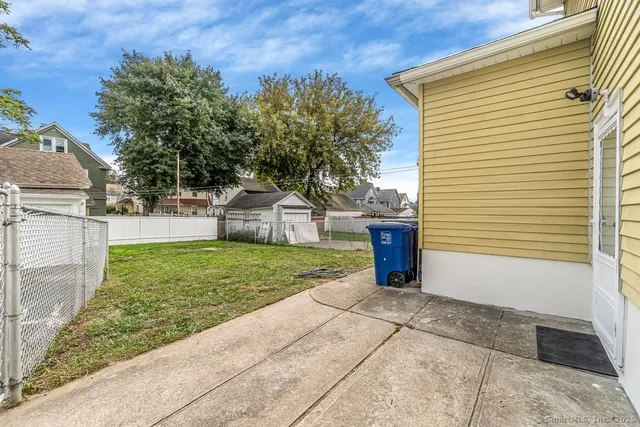 a view of a back yard of the house