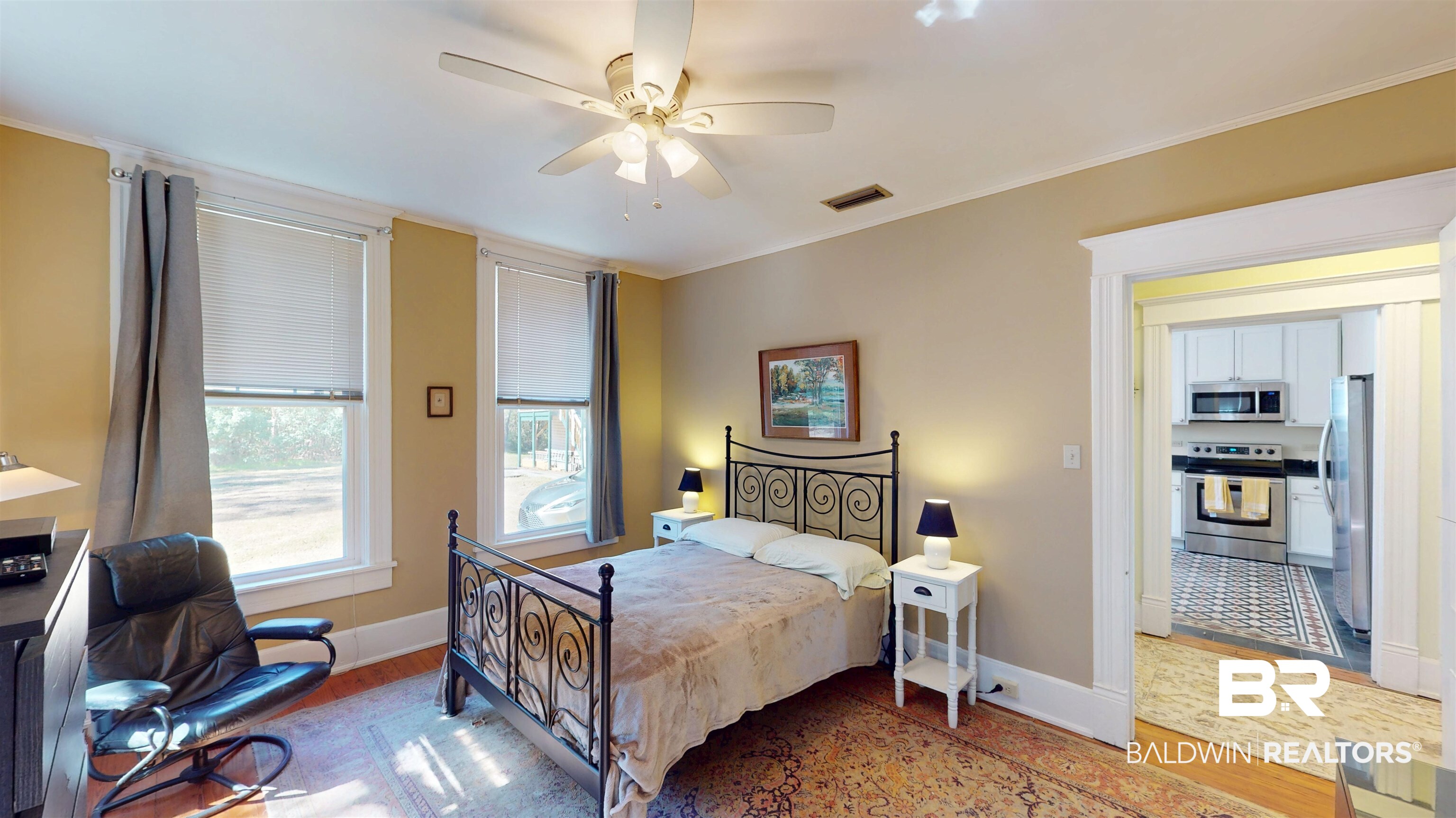 3220 Bayfront Road Mobile, AL 36605 - Photo 23 of 43 Bedroom with light wood finished floors, freestanding refrigerator, ornamental molding, and a ceiling fan