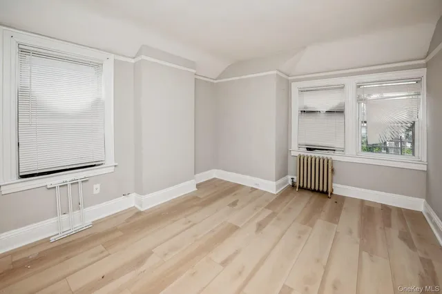 a view of an empty room and window