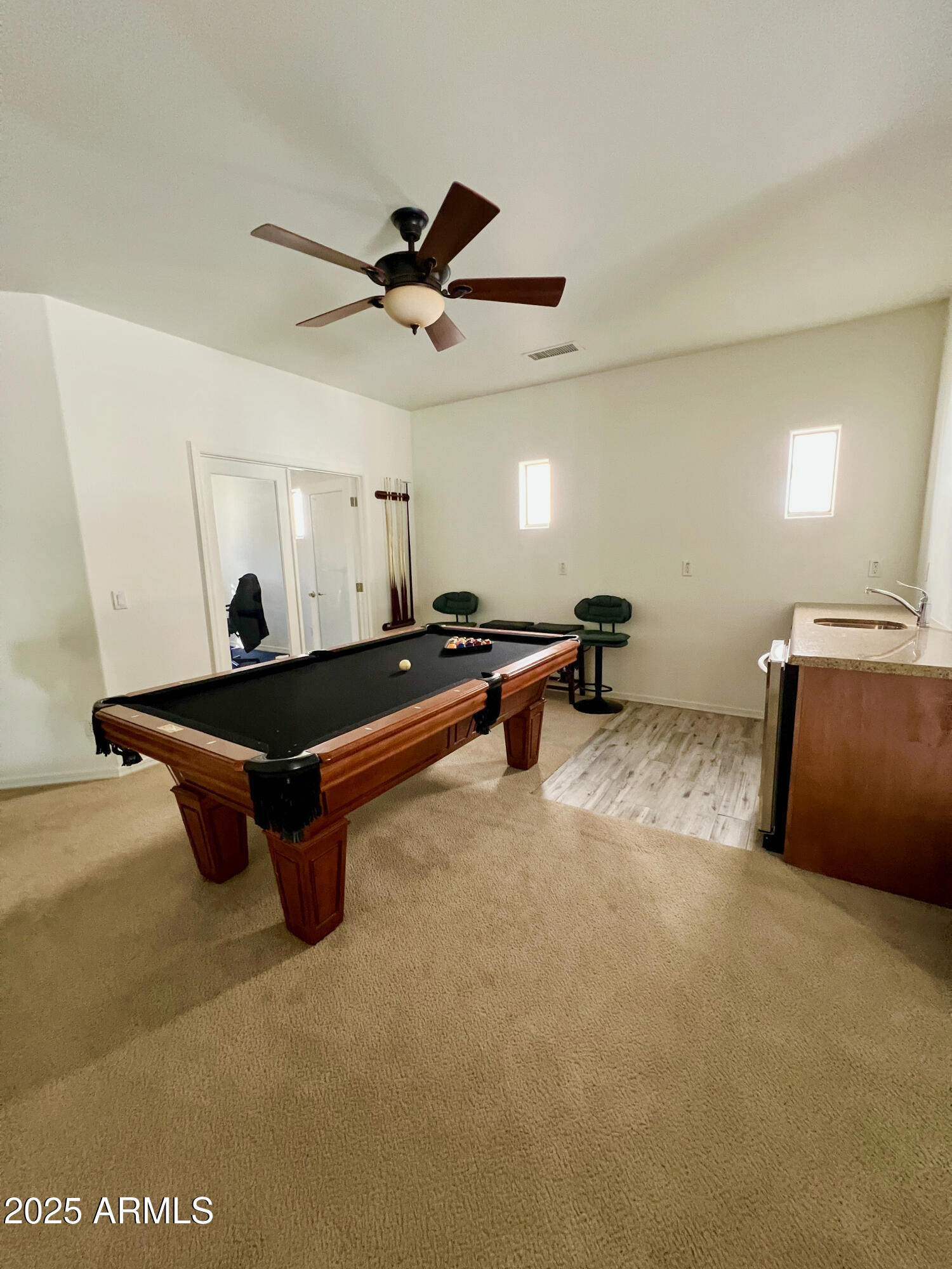 8131 North 13th Way Phoenix, AZ 85020 - Photo 13 of 25 a living room with furniture pool table and a ceiling fan
