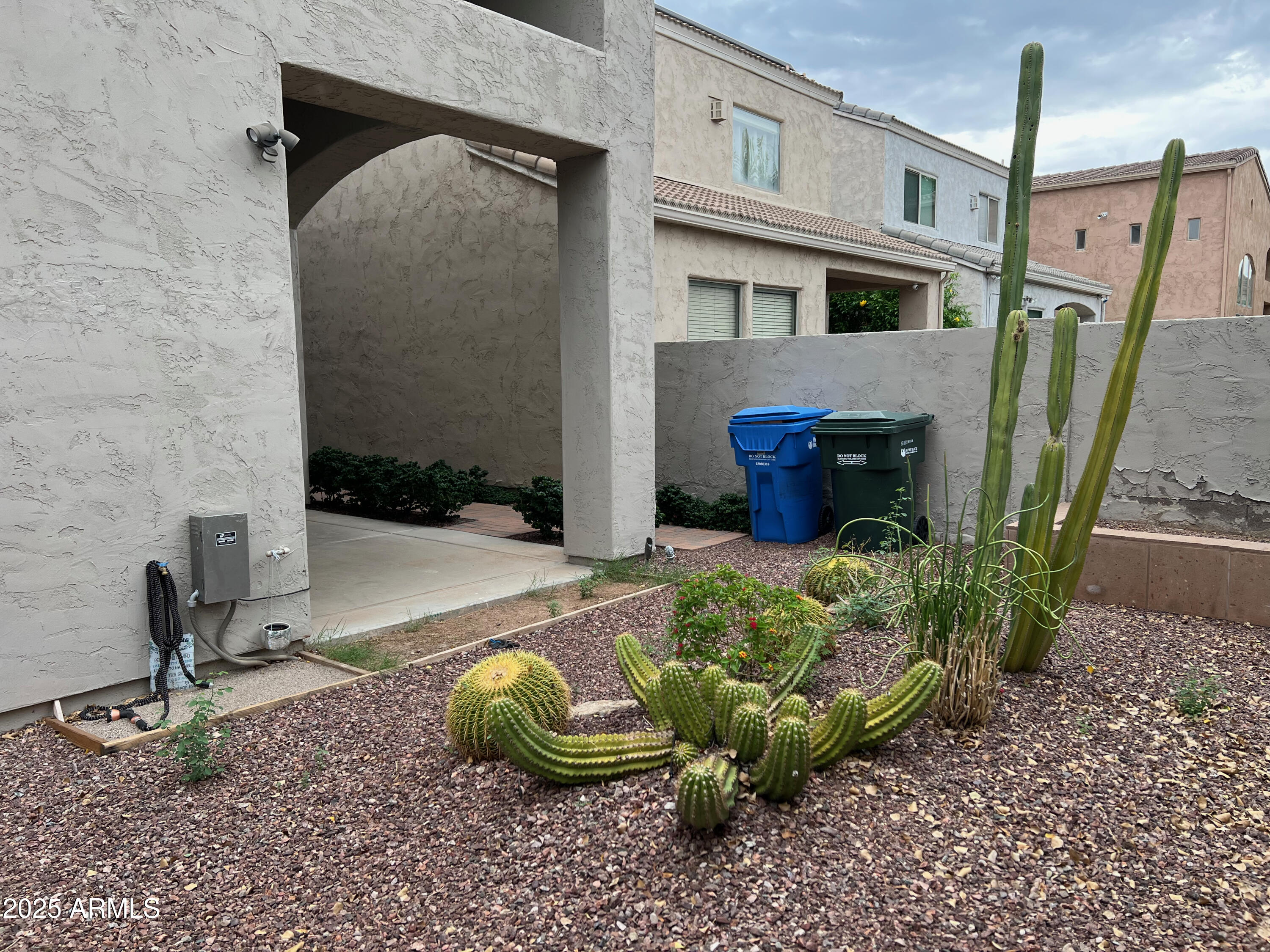 8131 North 13th Way Phoenix, AZ 85020 - Photo 21 of 25 a view of a backyard with garden