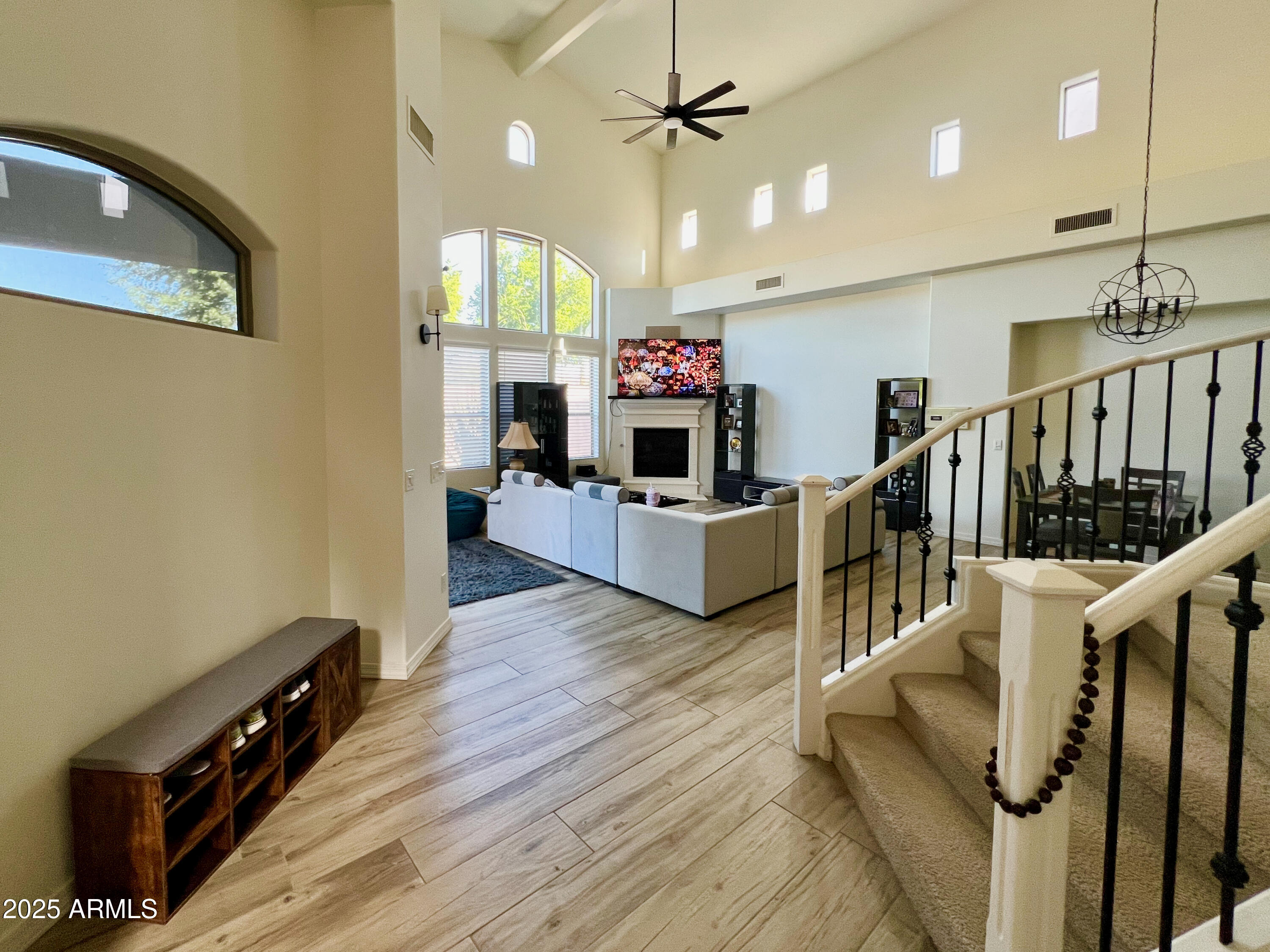 8131 North 13th Way Phoenix, AZ 85020 - Photo 4 of 25 a living room with furniture and a wooden floor