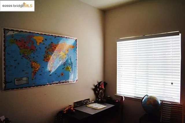 a room with furniture and window