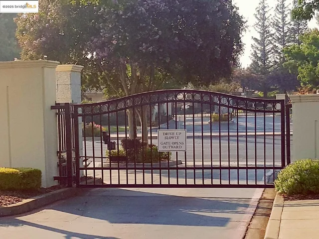 a picture of a refrigerator with white cabinets