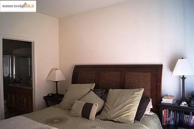 a living room with furniture a lamp and a fireplace