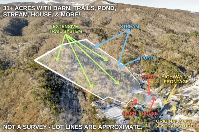 a view of a street with a building in the background