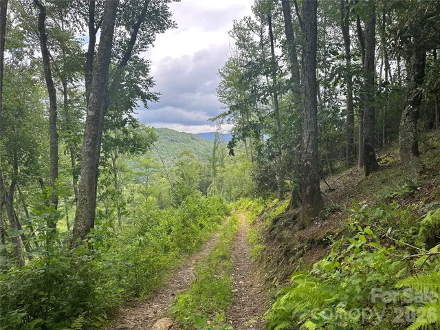 a view of a patio with a table and chairs