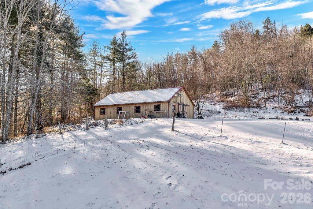 3606 Highway 194 Sugar Grove, NC 28679 - Photo 15 of 48 a view of a house with a yard and sitting area