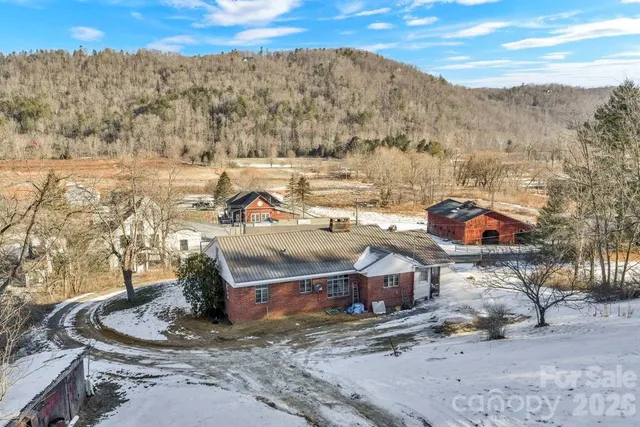 a bathroom with a toilet a sink and a mirror