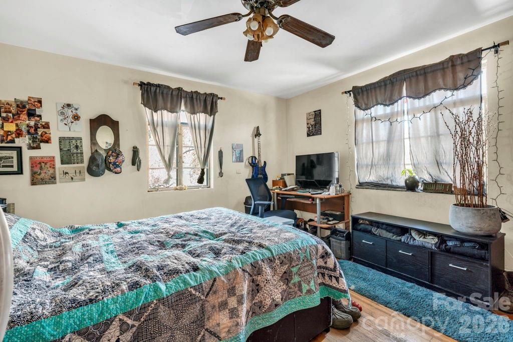 3606 Highway 194 Sugar Grove, NC 28679 - Photo 43 of 48 a bedroom with a bed and a flat screen tv