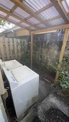 a view of a back yard of the house