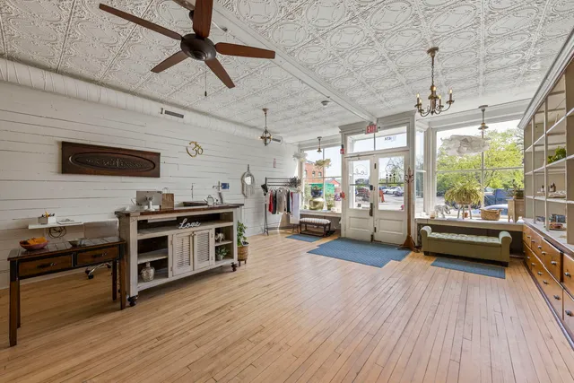 a kitchen with a stove a sink and a refrigerator