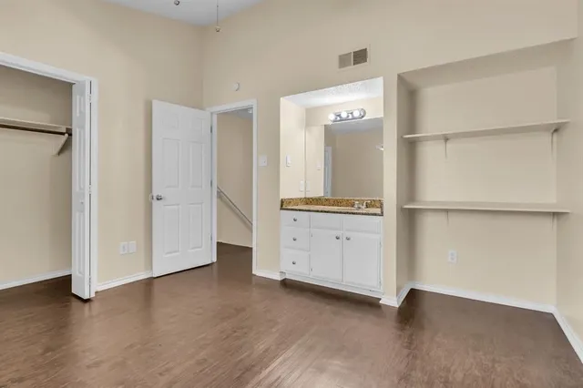 a bathroom with a toilet and a bathtub
