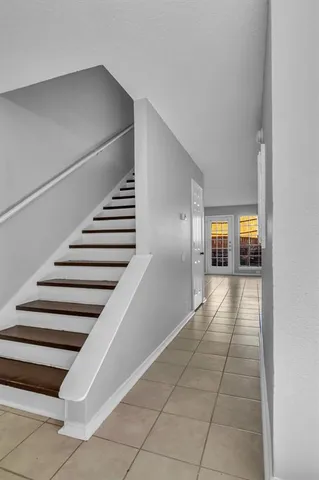 a kitchen with a stove and a microwave