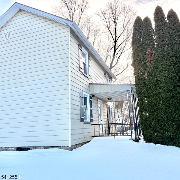 2720 River Road Phillipsburg, NJ 08865 - Photo 4 of 15 a view of a house with a yard and garage