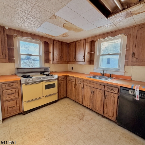 2720 River Road Phillipsburg, NJ 08865 - Photo 6 of 15 a kitchen with stainless steel appliances granite countertop a stove sink and cabinets