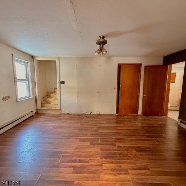 2720 River Road Phillipsburg, NJ 08865 - Photo 9 of 15 a view of empty room with wooden floor and fan
