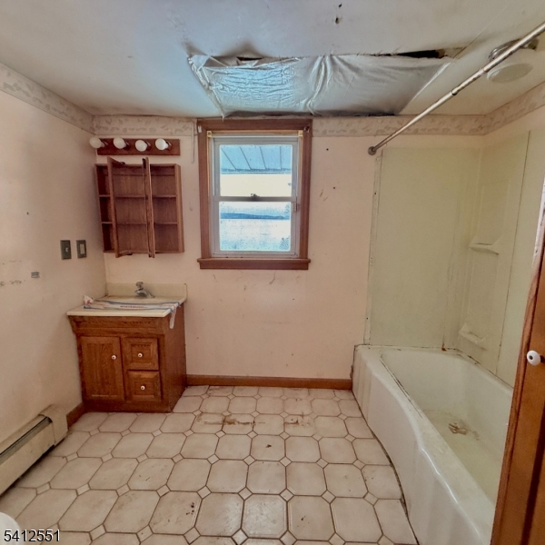 2720 River Road Phillipsburg, NJ 08865 - Photo 10 of 15 a bathroom with a sink a bathtub and a shower