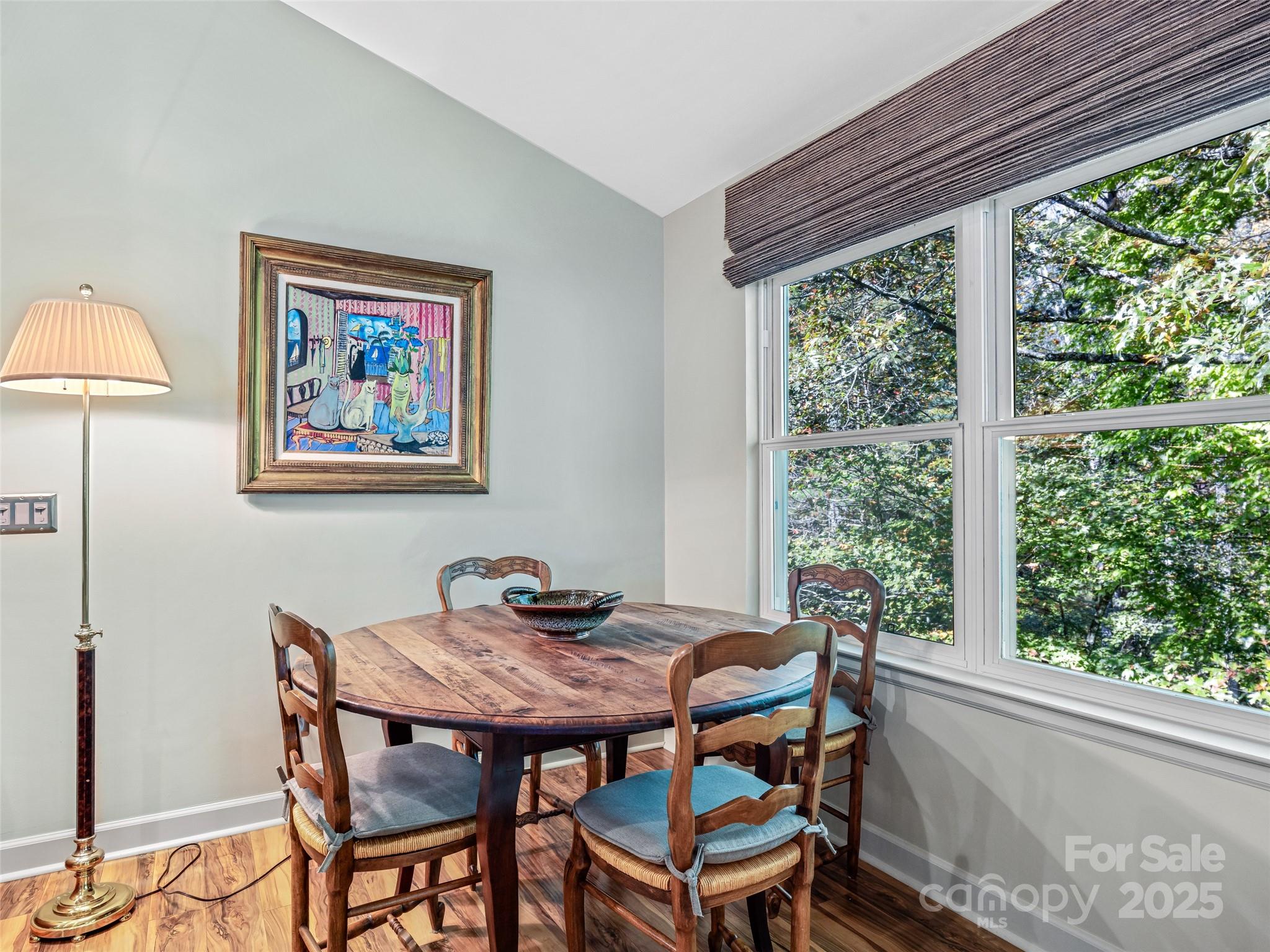 73 Ridgetop Circle, Unit 303 Brevard, NC 28712 - Photo 12 of 28 a dining room with furniture and window