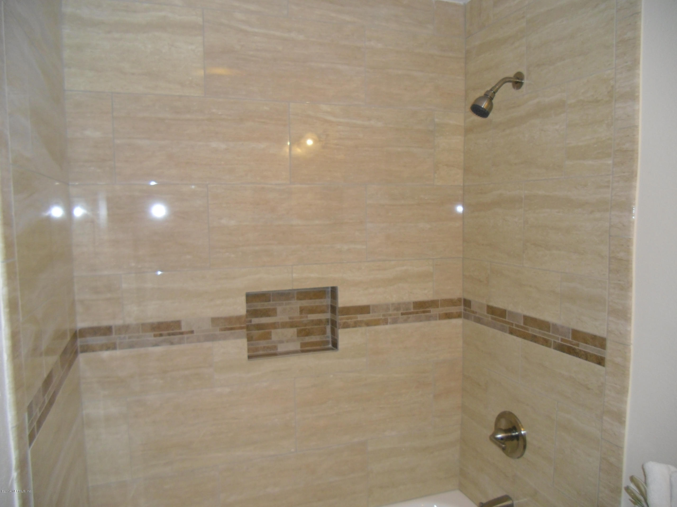 4221 Spring Park Road Jacksonville, FL 32207 - Photo 37 of 56 a bathroom with a shower