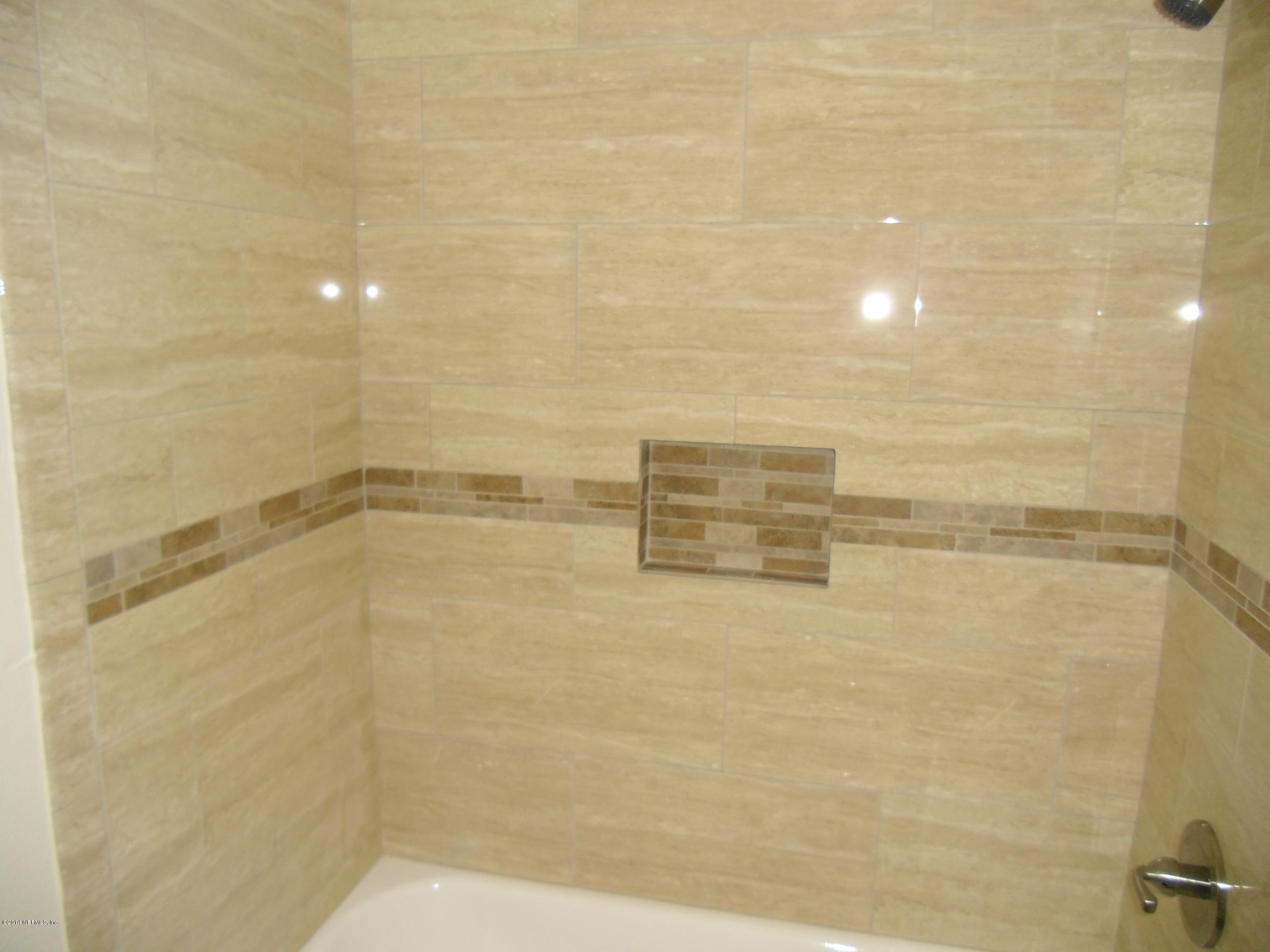 4221 Spring Park Road Jacksonville, FL 32207 - Photo 38 of 56 a bathroom with a shower