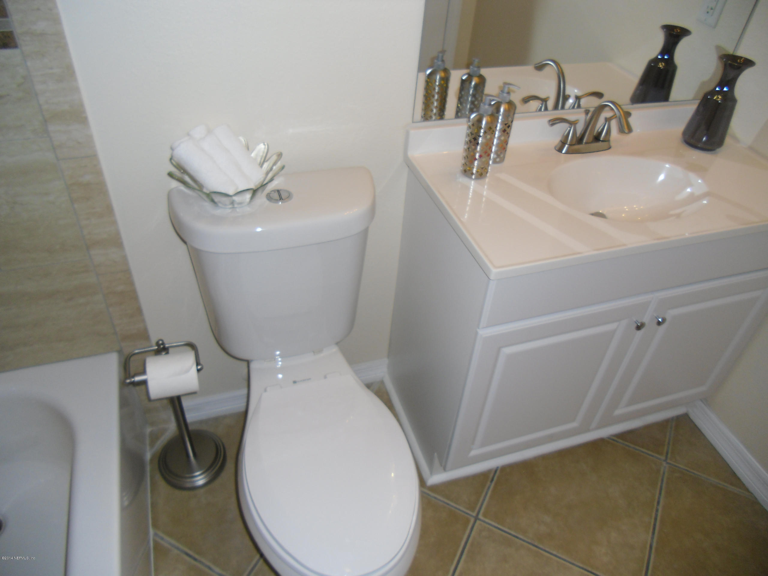 4221 Spring Park Road Jacksonville, FL 32207 - Photo 45 of 56 a bathroom with a sink and toilet