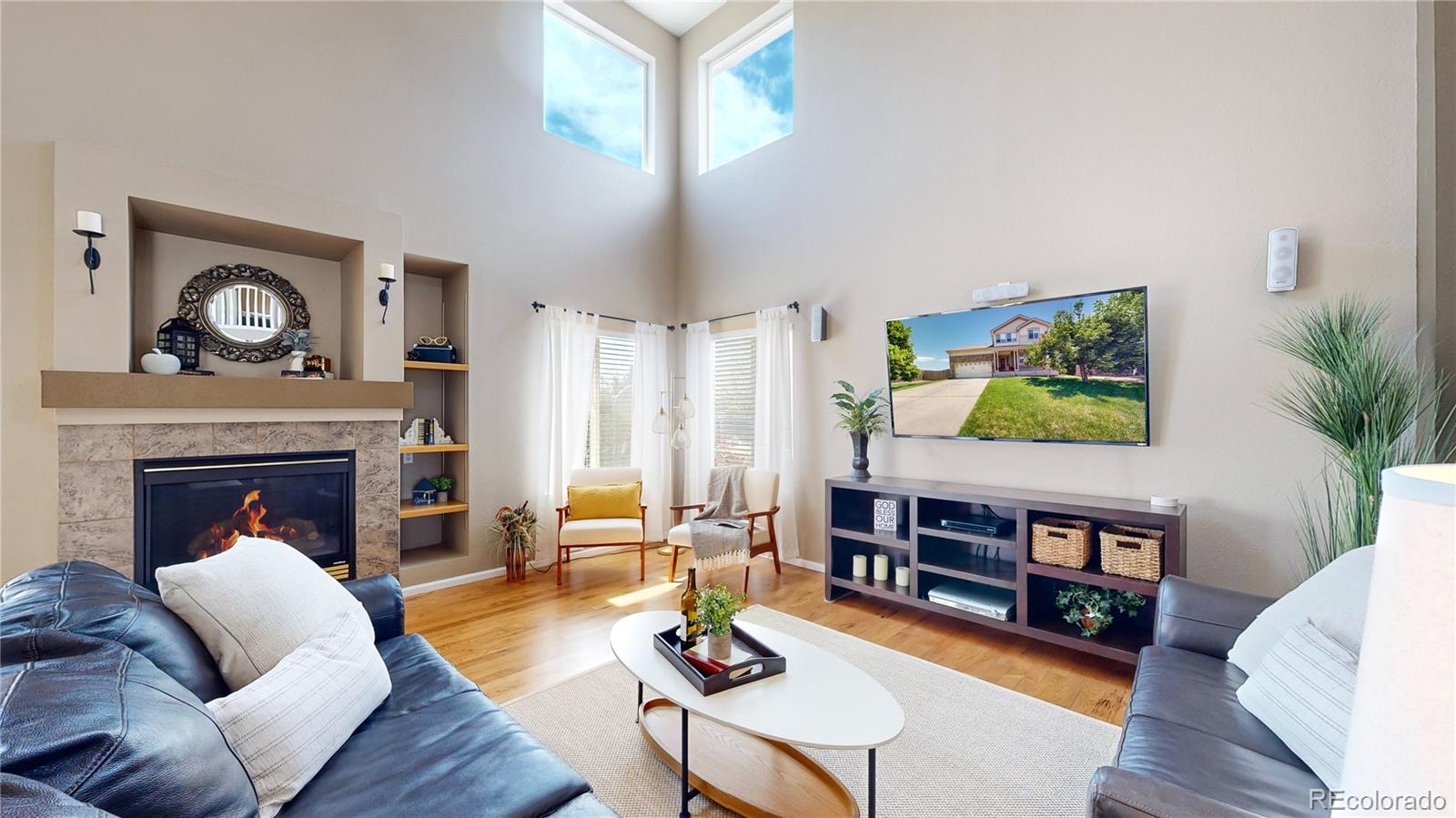 5759 Canyon Circle Longmont, CO 80504 - Photo 5 of 37 a living room with furniture and a fireplace