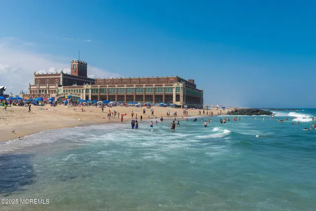 a view of a swimming pool and a yard
