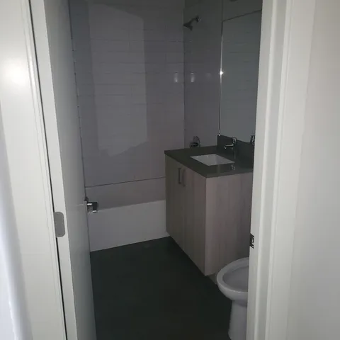 a bathroom with a sink and mirror