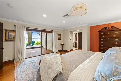 a view of entryway livingroom and hall with wooden floor