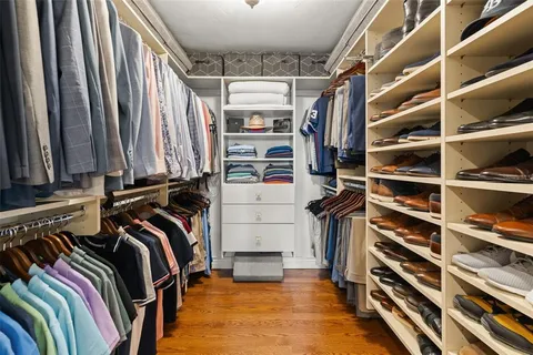 a kitchen with stainless steel appliances granite countertop a stove and a sink