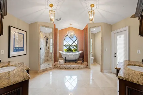 a kitchen with a refrigerator and a sink