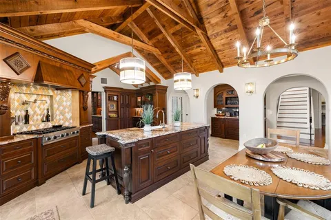 a view of a swimming pool with a yard