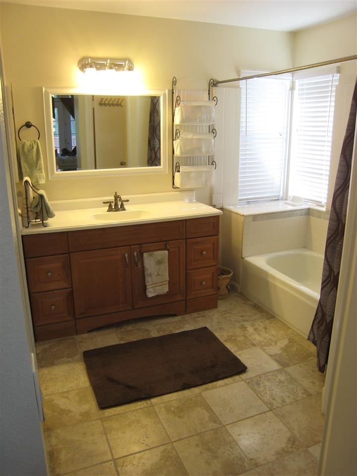 1418 Henshaw Road Oceanside, CA 92056 - Photo 15 of 25 Masther Bath Suite has a spa tub shower and a seperate room for the toilet.
