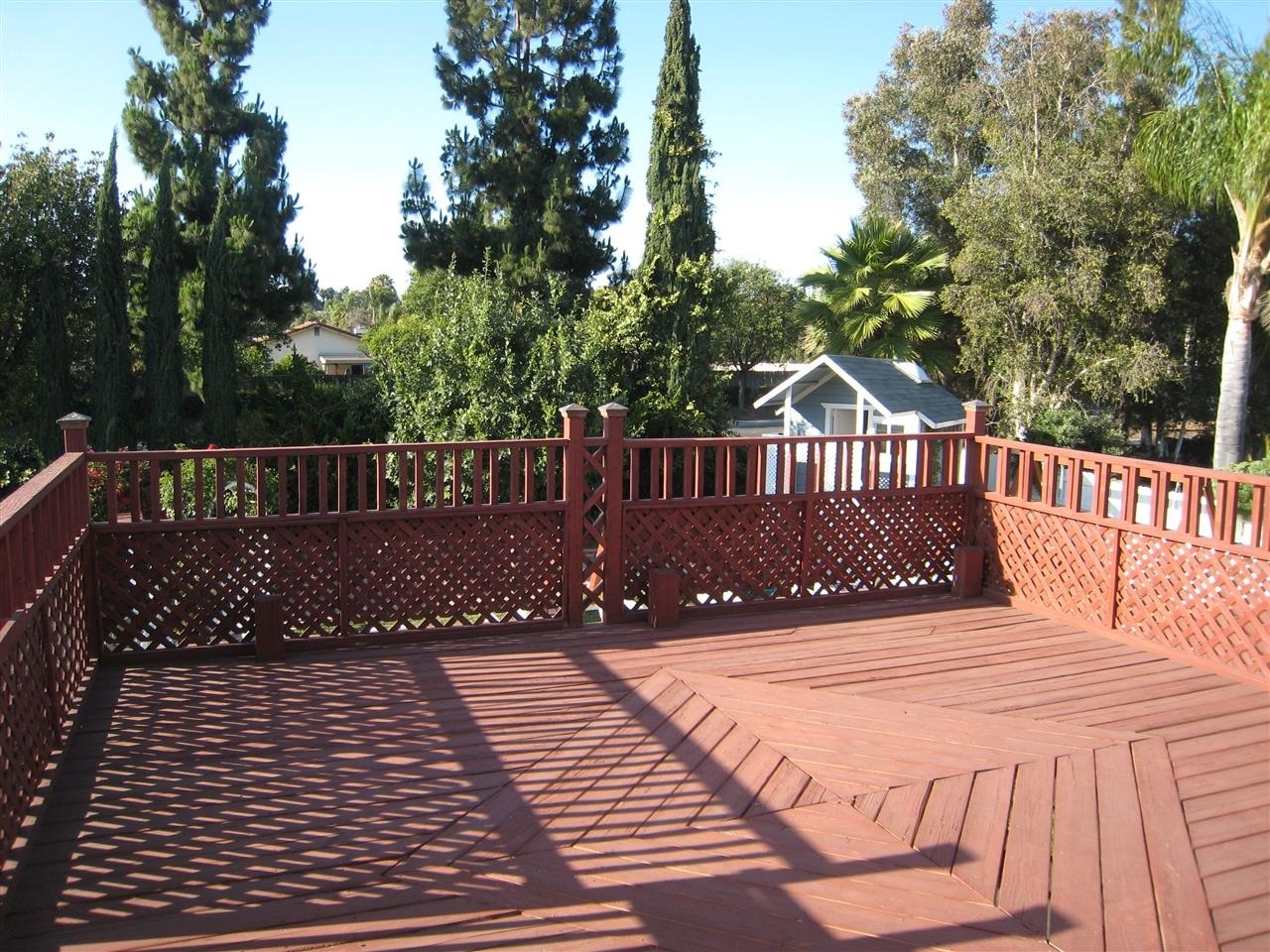 1418 Henshaw Road Oceanside, CA 92056 - Photo 16 of 25 Open the French Doors out to a large deck over looking the spacious backyard.