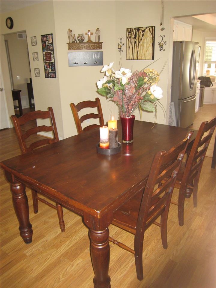 1418 Henshaw Road Oceanside, CA 92056 - Photo 4 of 25 Enjoy a family dinner in this spacious dining and living area. The Kitchen is to the right and family room to the left.