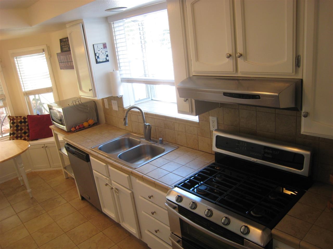 1418 Henshaw Road Oceanside, CA 92056 - Photo 7 of 25 Stainless steel Gourmet Oven & Range.