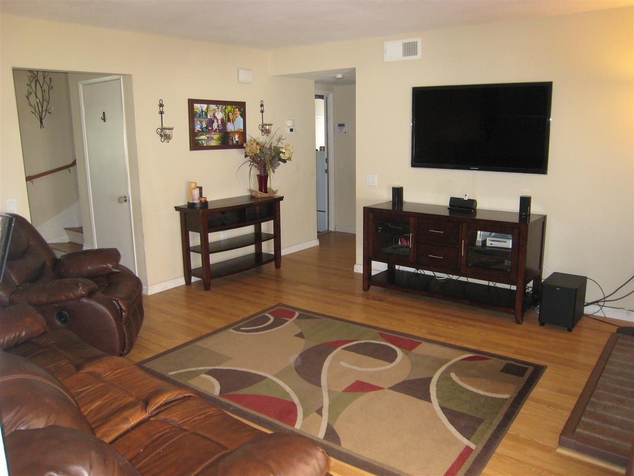 1418 Henshaw Road Oceanside, CA 92056 - Photo 10 of 25 Looking left into the Great Room, looking right into the hall, garage entry, first floor full bath and first floor bedroom currently used as an office.