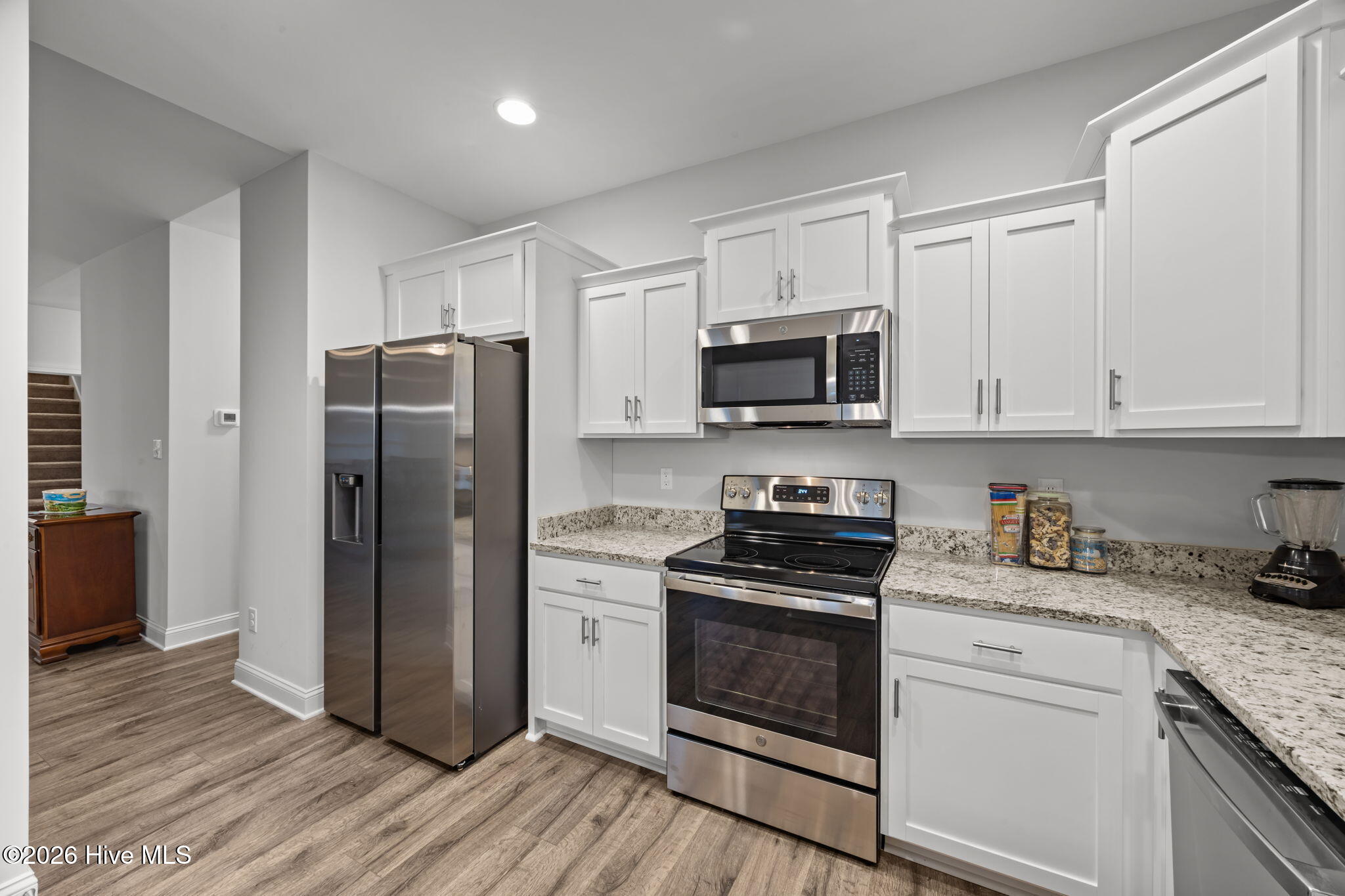 3002 Sharpnose Street New Bern, NC 28562 - Photo 11 of 53 Kitchen - showing the range, microwave and refrigerator.