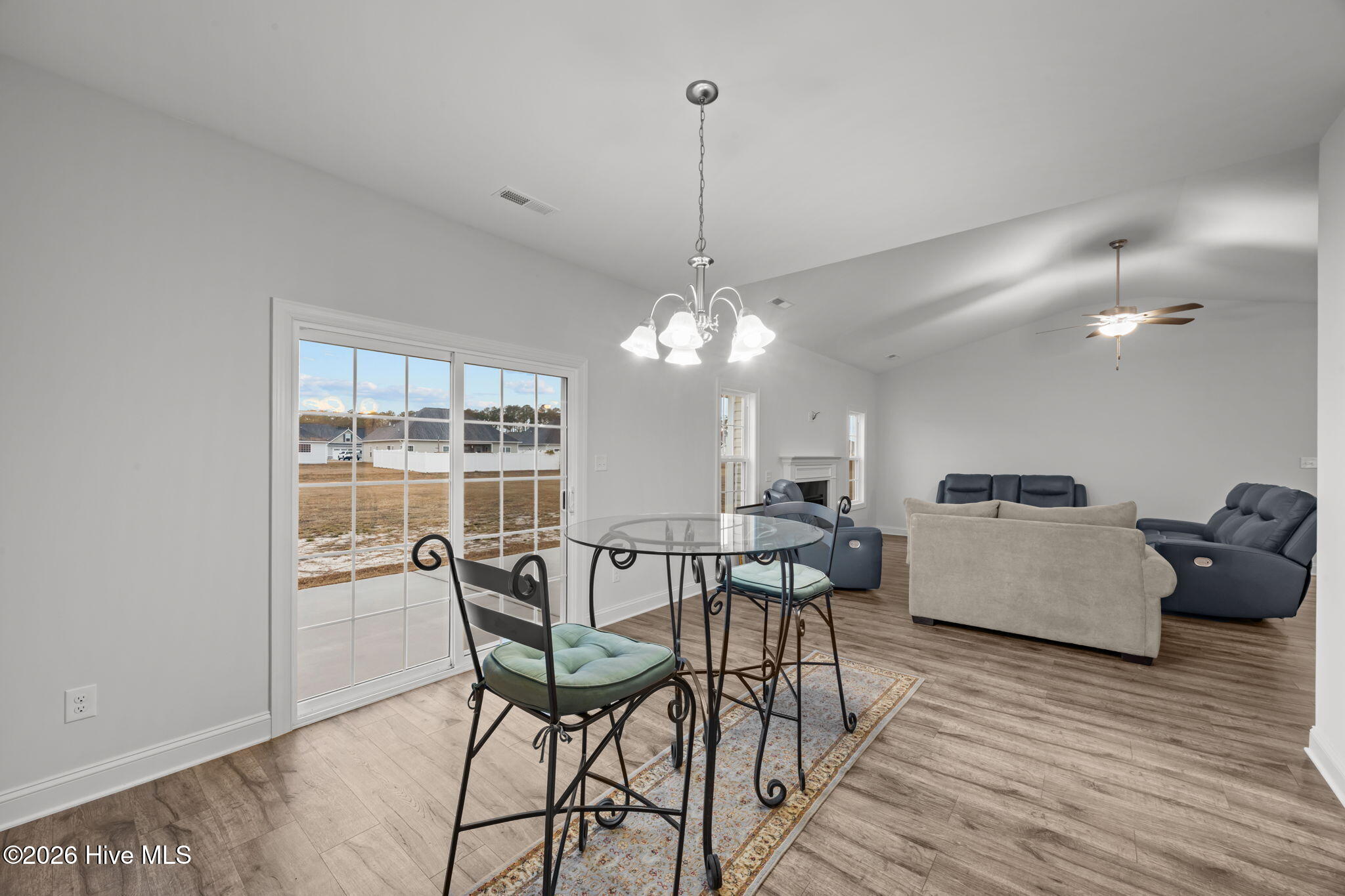3002 Sharpnose Street New Bern, NC 28562 - Photo 14 of 53 Dining area looking towards the living area and sliding patio doors.