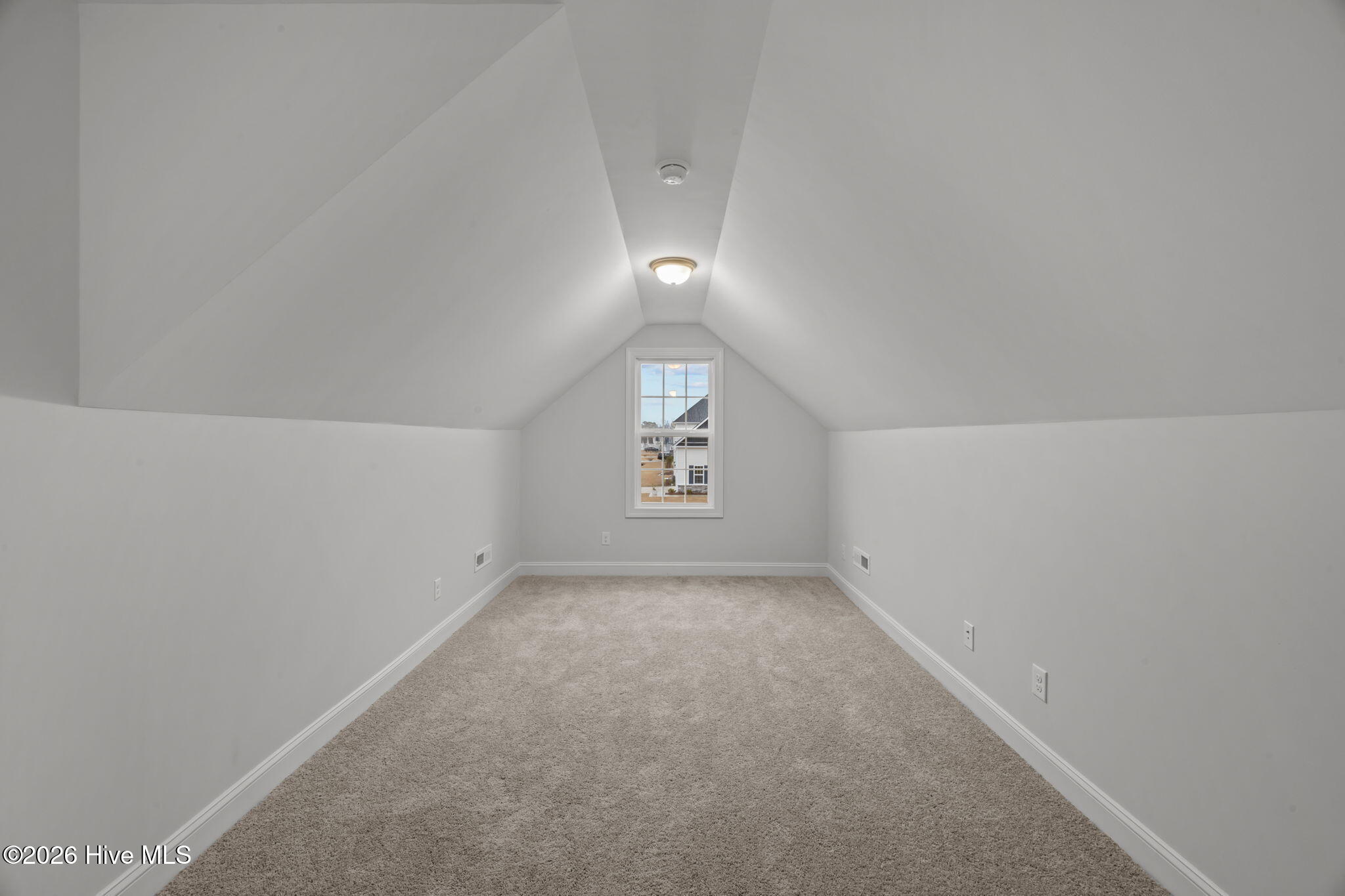 3002 Sharpnose Street New Bern, NC 28562 - Photo 27 of 53 4th bedroom, guest bedroom, office, or playroom (21' x 10') over the garage. Zoned HVAC.