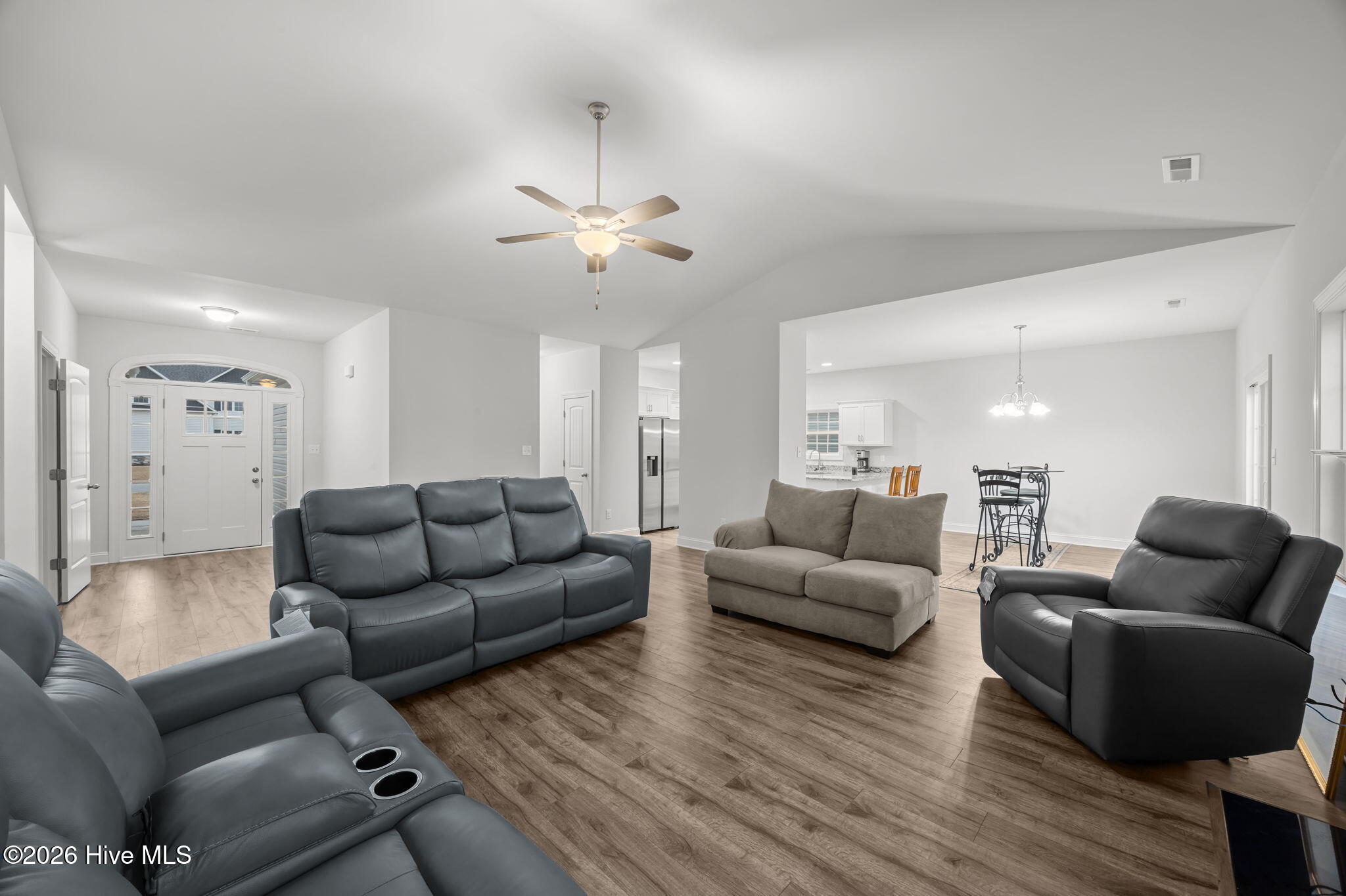 3002 Sharpnose Street New Bern, NC 28562 - Photo 5 of 53 Living area (18' x 21') with view of thefoyer and front door.