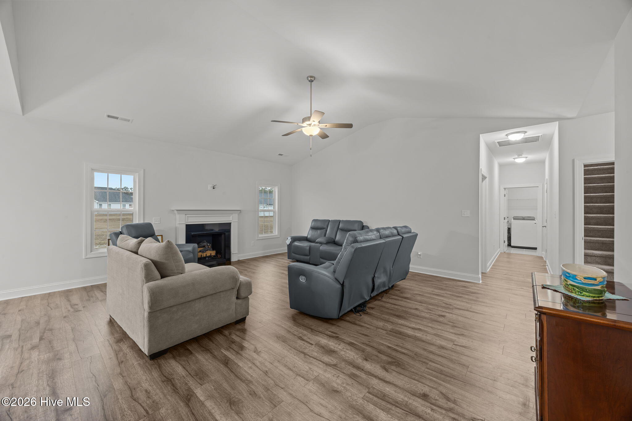 3002 Sharpnose Street New Bern, NC 28562 - Photo 7 of 53 Living area with view of gas fireplace.