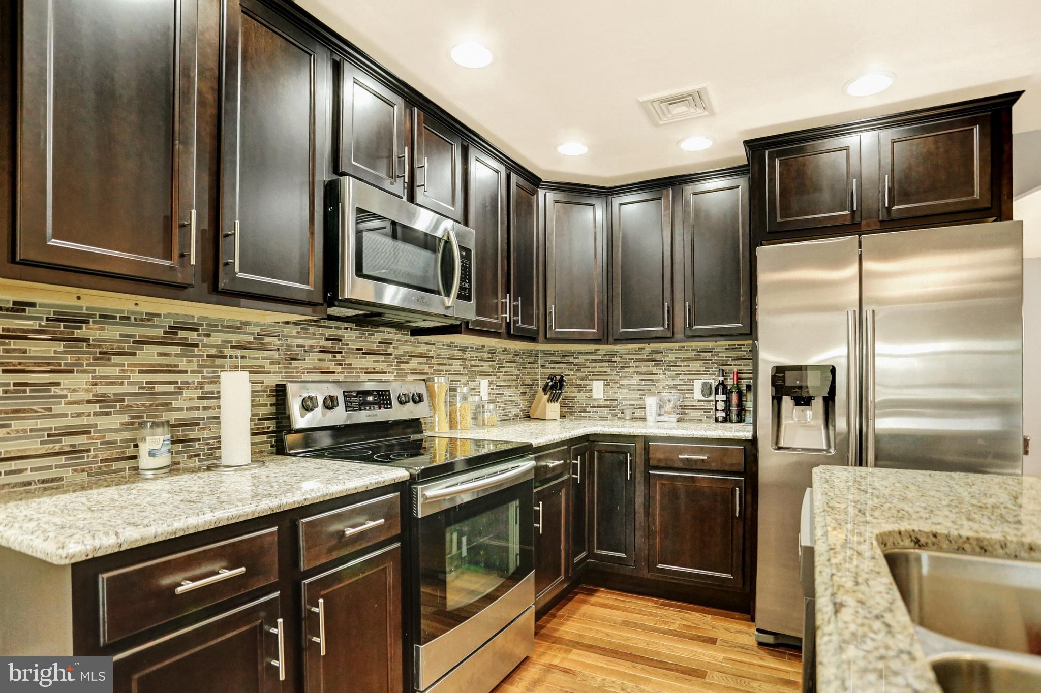 199 Ridge Hill Road Mechanicsburg, PA 17050 - Photo 12 of 36 Updated open kitchen with granite counter tops