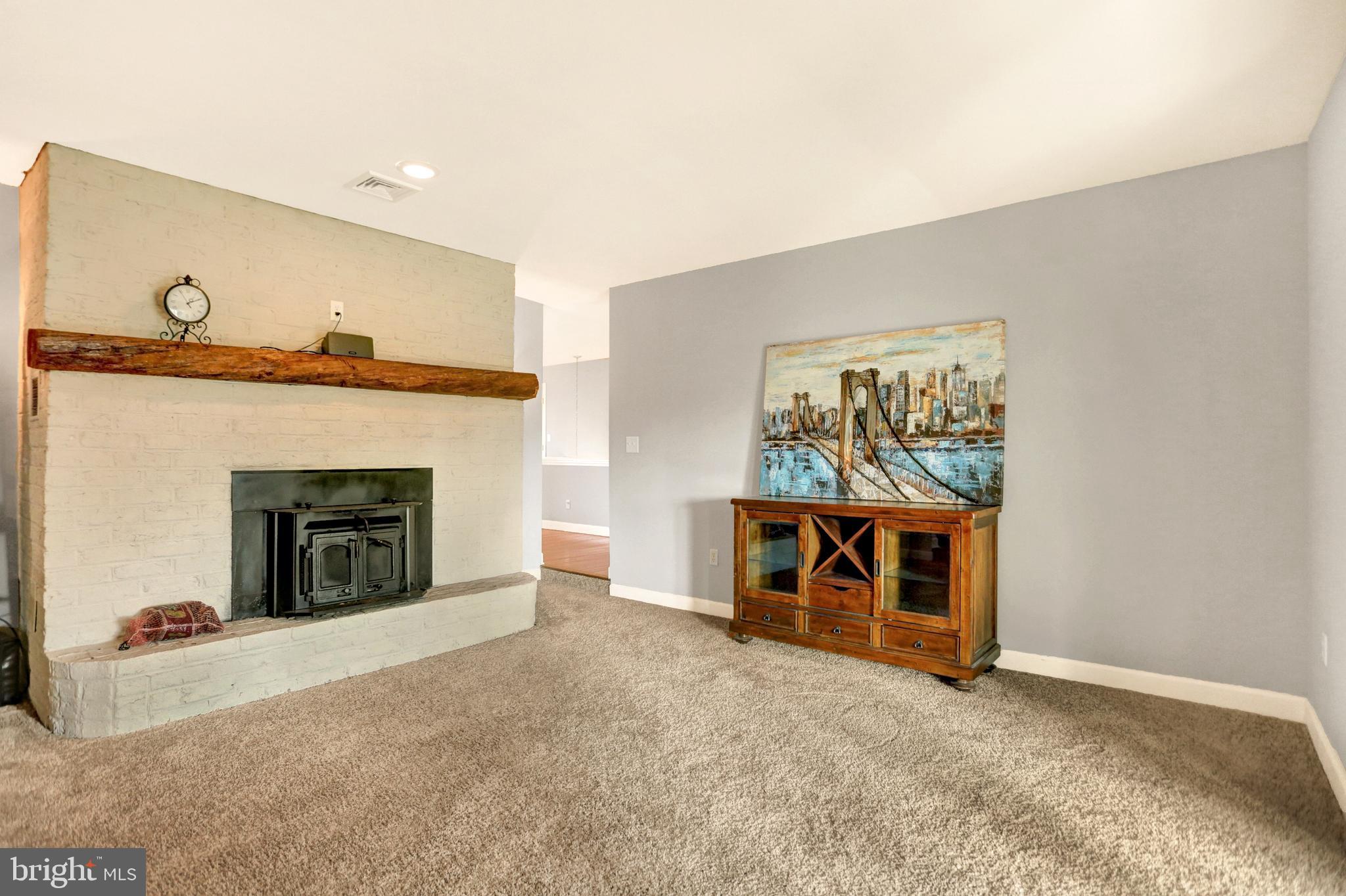 199 Ridge Hill Road Mechanicsburg, PA 17050 - Photo 16 of 36 Family room with fireplace