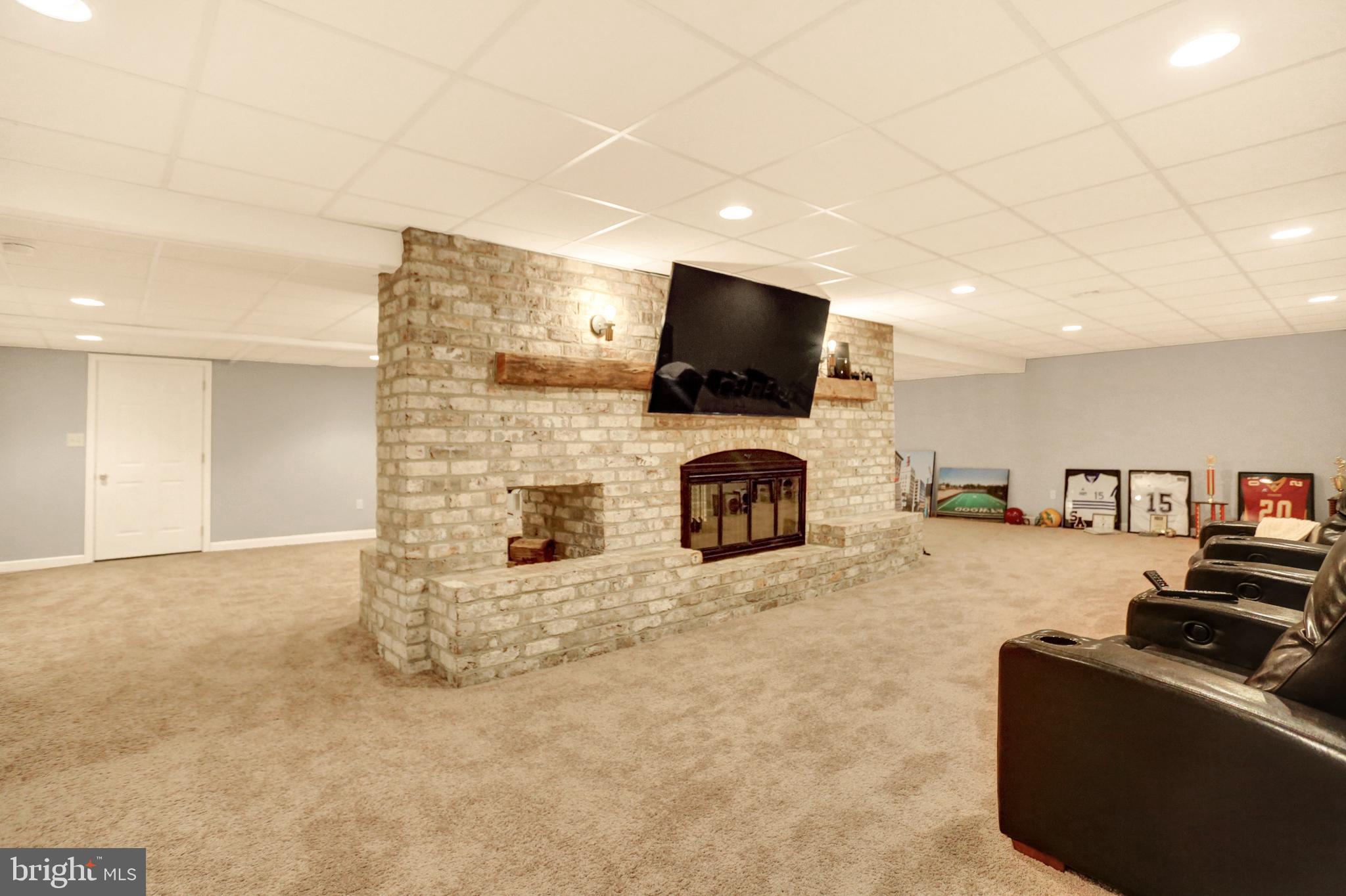 199 Ridge Hill Road Mechanicsburg, PA 17050 - Photo 28 of 36 Basement dual sided fireplace