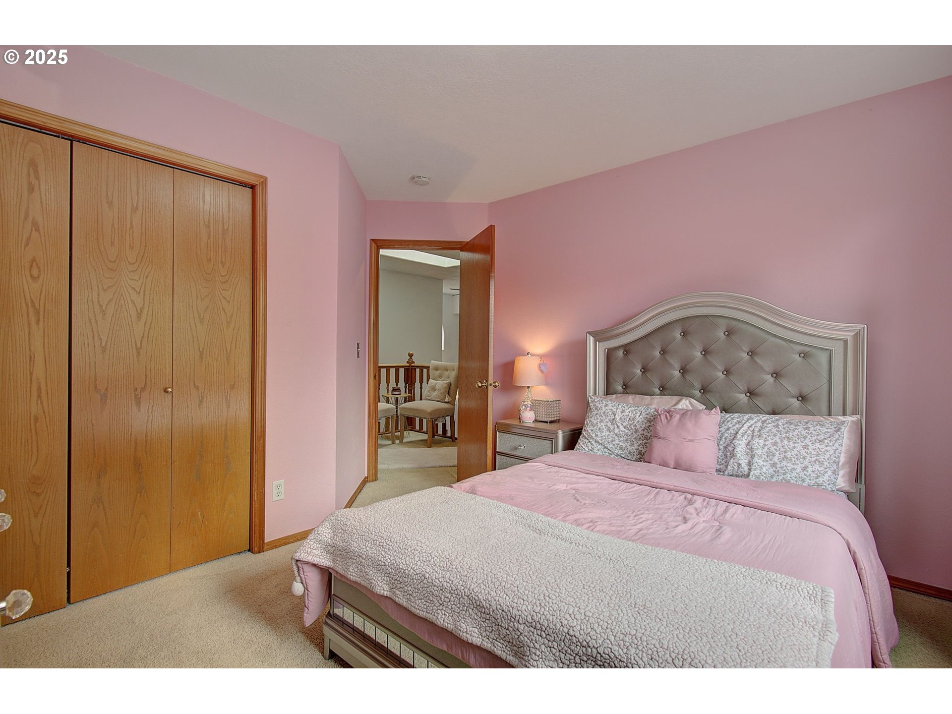 1758 Northwest 18th Court Gresham, OR 97030 - Photo 21 of 43 a bedroom with a bed and a closet