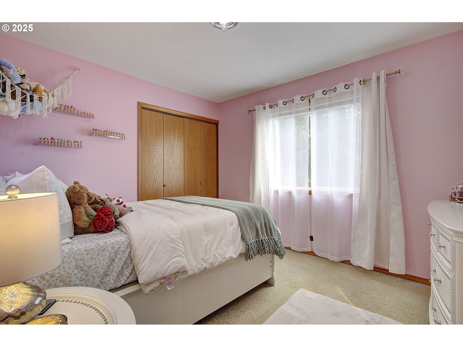 1758 Northwest 18th Court Gresham, OR 97030 - Photo 22 of 43 a bedroom with a bed and a window