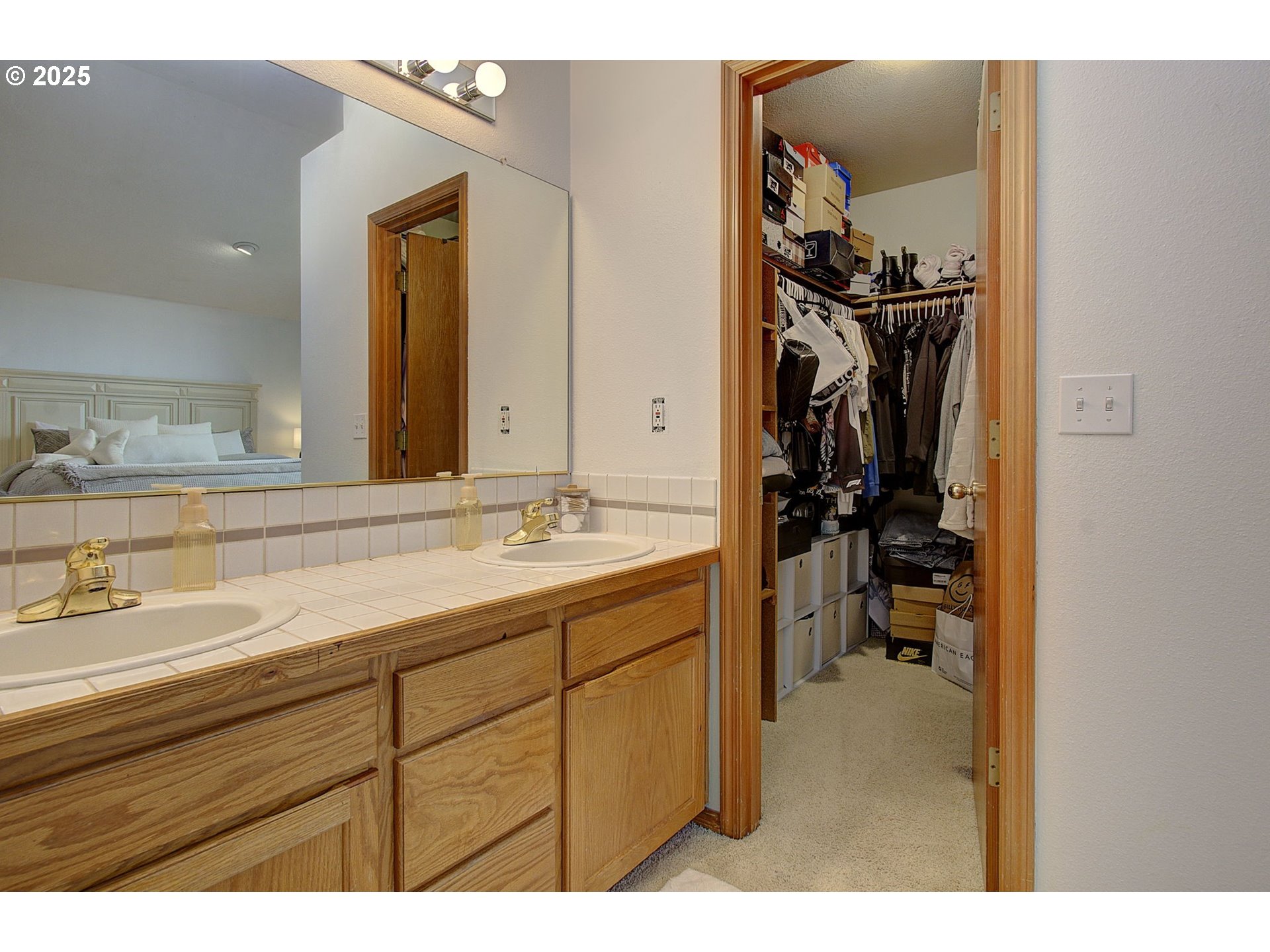 1758 Northwest 18th Court Gresham, OR 97030 - Photo 27 of 43 a en suite bathroom with a sink and mirror